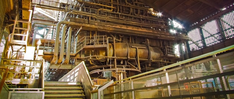 Conserving oil and grease in a steel mill